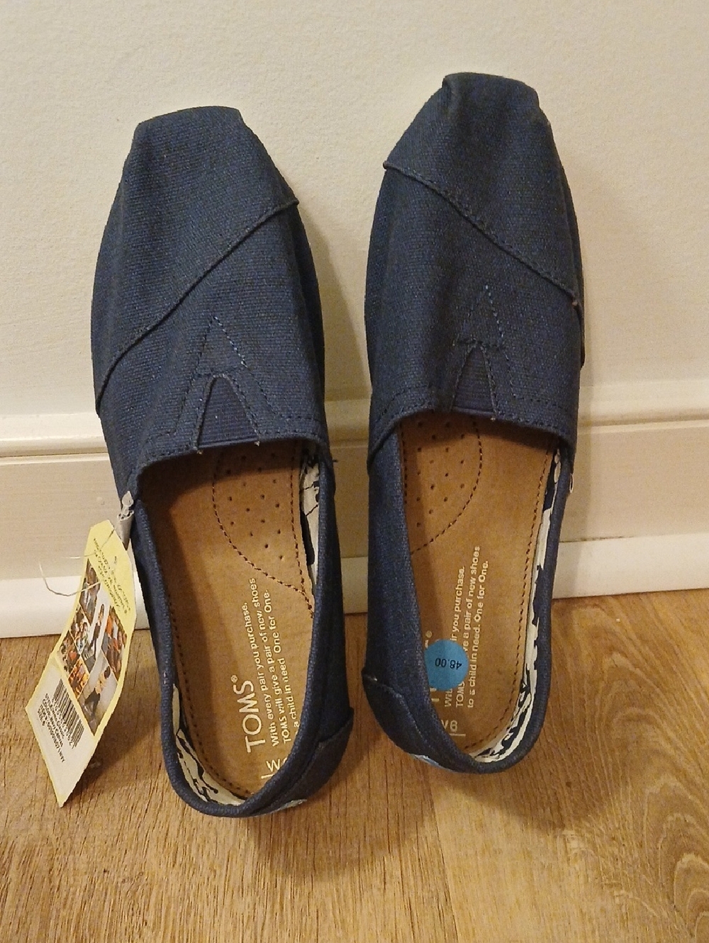 Toms navy canvas slip-on shoes -size 6